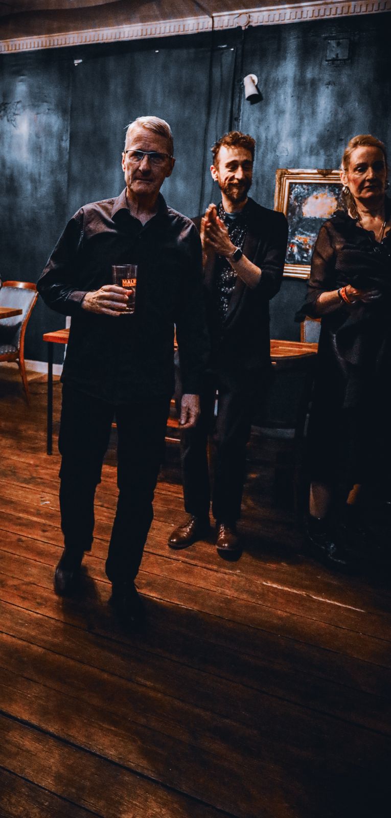 Band members and friends in the venue after the concert